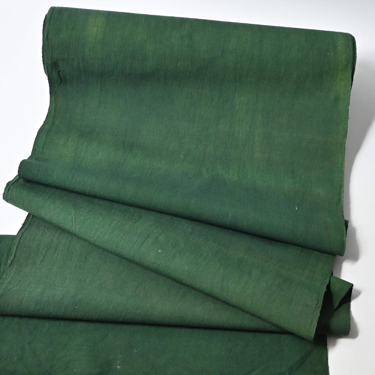 Vintage Japanese dead stock indigo green futon cover fabric bolt from early to mid 20th C, sold by the metre.