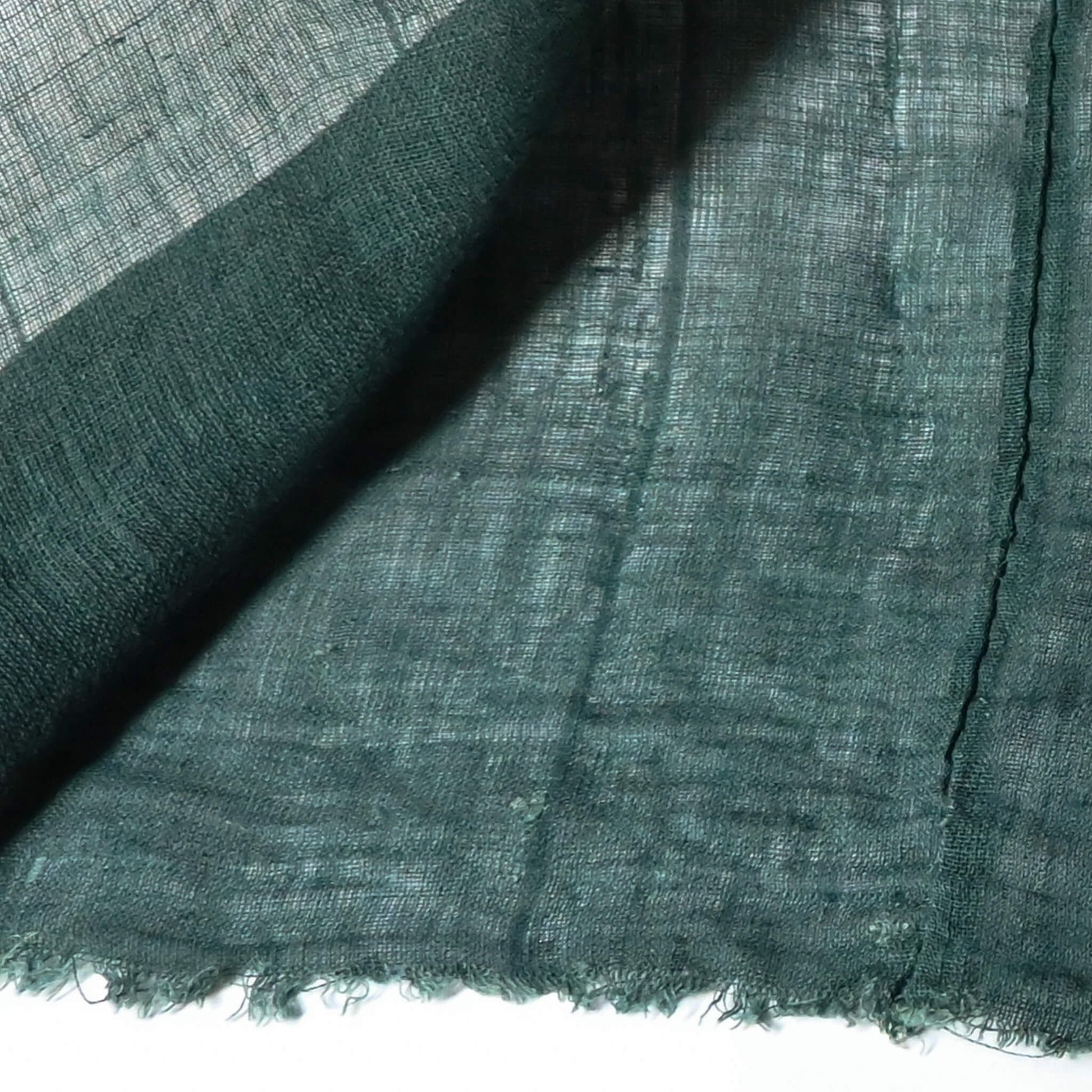 Detailed view of vintage Japanese indigo green hemp piece, originally Kaya mosquito net.