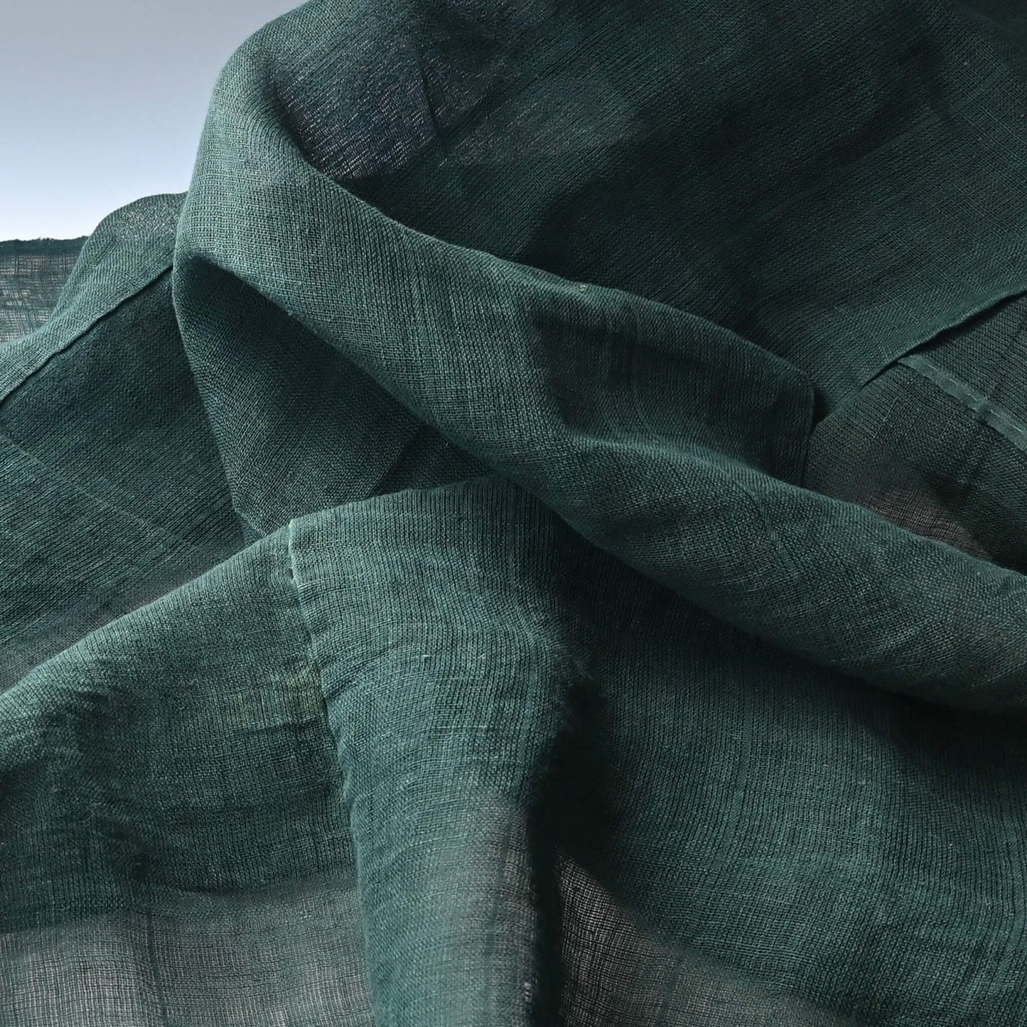 Detailed view of vintage Japanese indigo green hemp piece, originally Kaya mosquito net.
