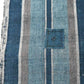 A mended patch of vintage Japanese indigo stripe cotton futon cover panel.