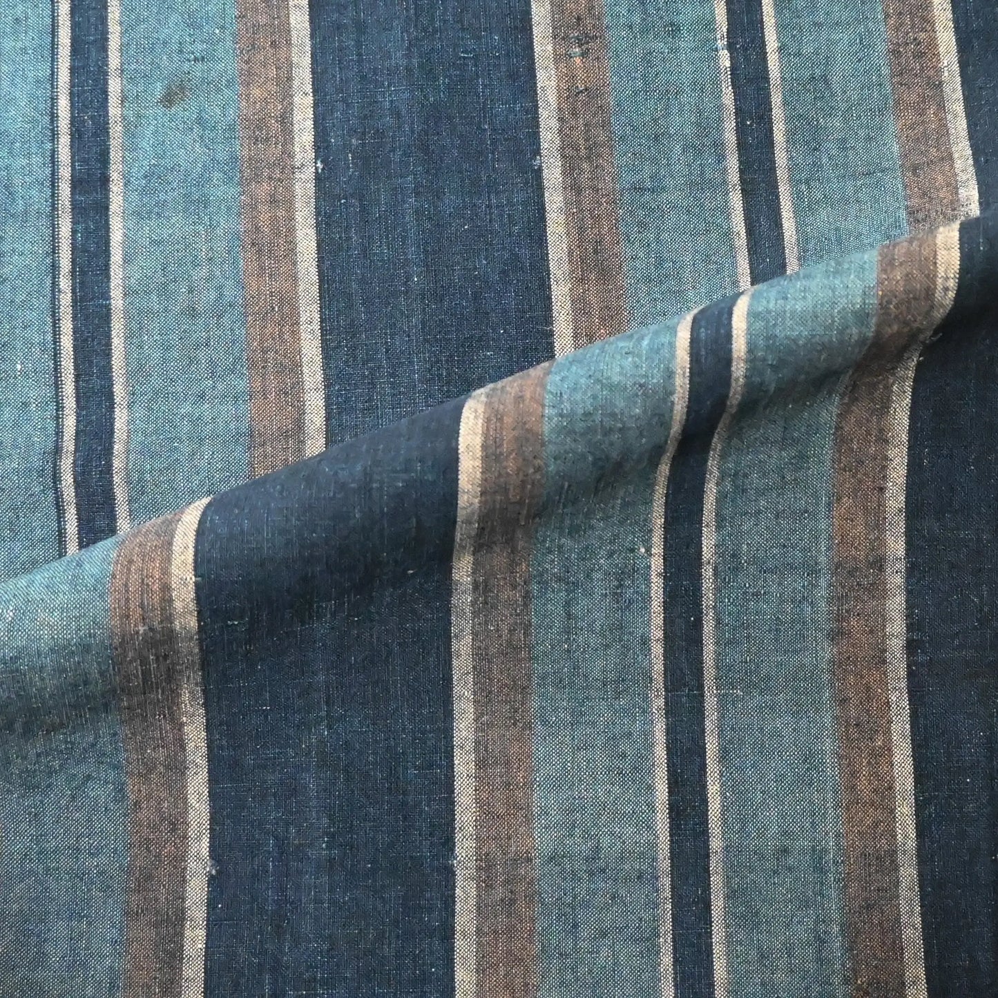 Detailed view of vintage Japanese indigo stripe cotton futon cover panel.