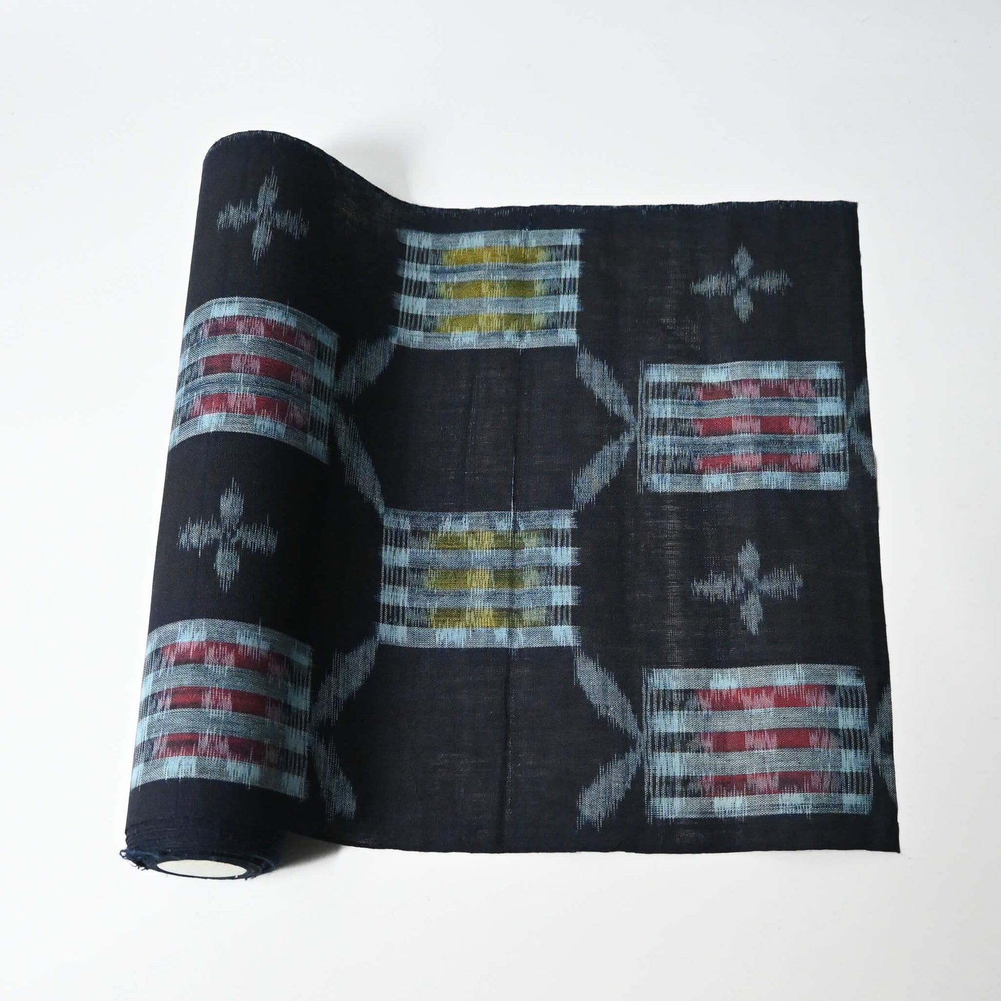 Vintage Japanese Bingo kasuri cotton kimono fabric roll sold by the metre.