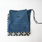 Vintage Japanese indigo cotton Koshimaki, a traditional waist wrap, with Kasuri Shippō-tsunagi motif.