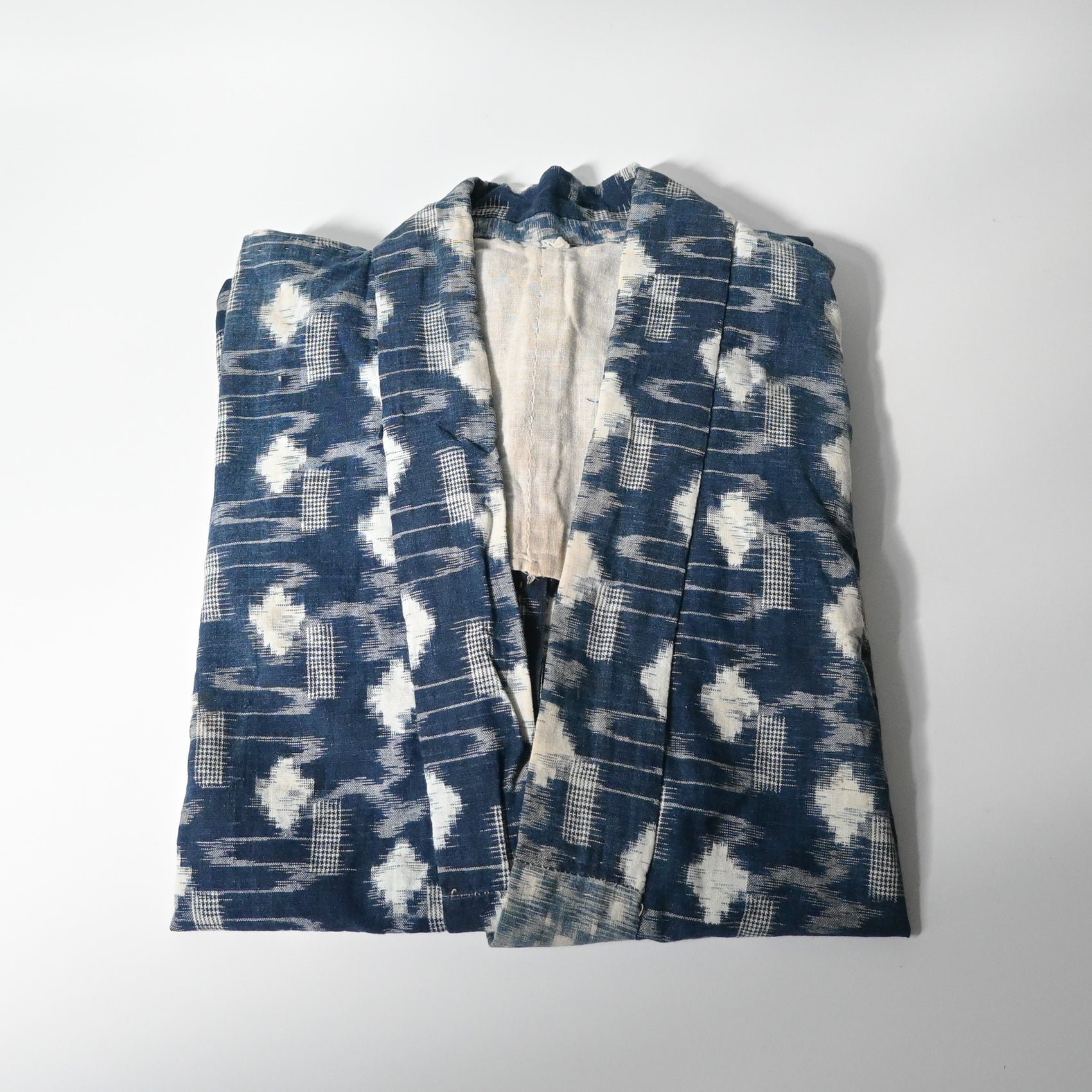 Vintage indigo kasuri cotton Noragi kimono, farmer's jacket, from the early to mid-20th century.