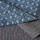 Close-up view of vintage indigo kasuri cotton with all-over sashiko stitch with texture.