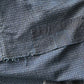 Detailed view of vintage four-panel indigo cotton futon cover with subtle Kasuri pattern from 20th century.