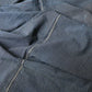 Detailed view of vintage four-panel indigo cotton futon cover with subtle Kasuri pattern from 20th century.