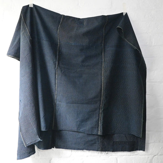 Full view of vintage four-panel indigo cotton futon cover with subtle Kasuri pattern from 20th century.