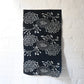 Full view of vintage indigo katazome cotton fragment with peony, chrysanthemum and noshi paper motifs.