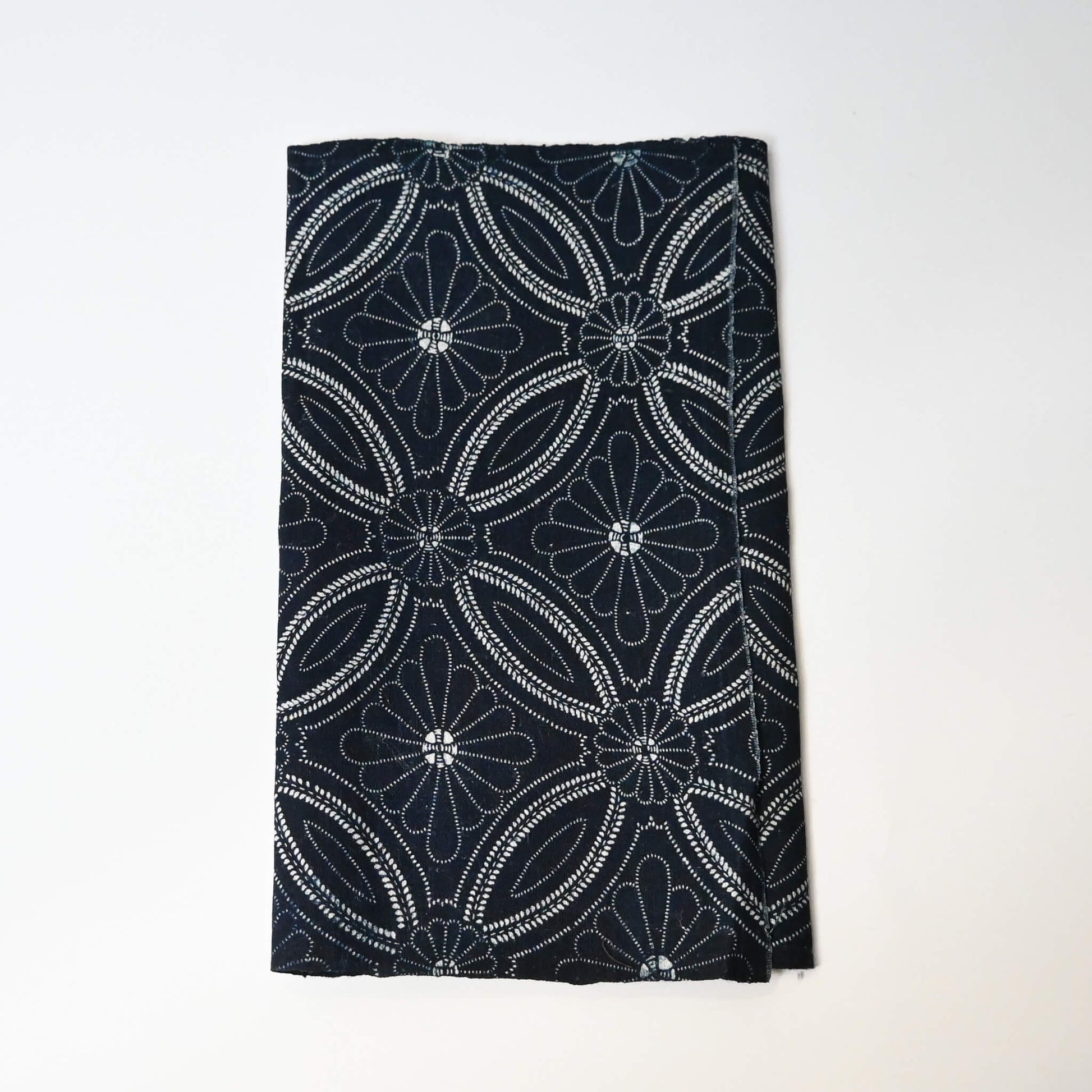 Vintage indigo katazome cotton piece with Shippo-tsunagi with stylised chrysanthemum motif.