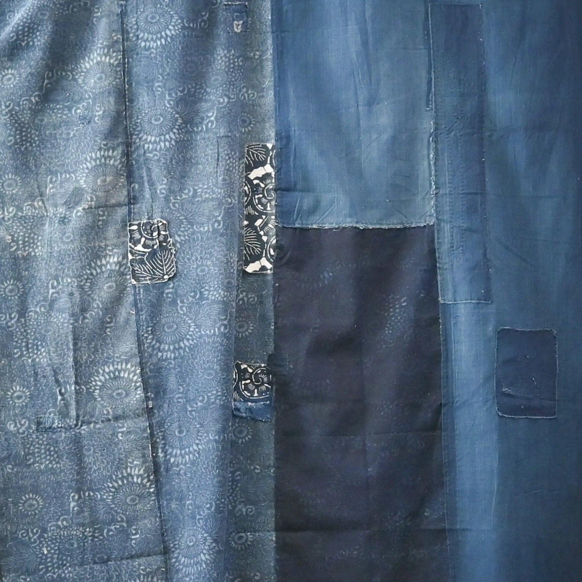 Detailed view of vintage Japanese indigo Katazome dyed and indigo plain cotton futon cover.
