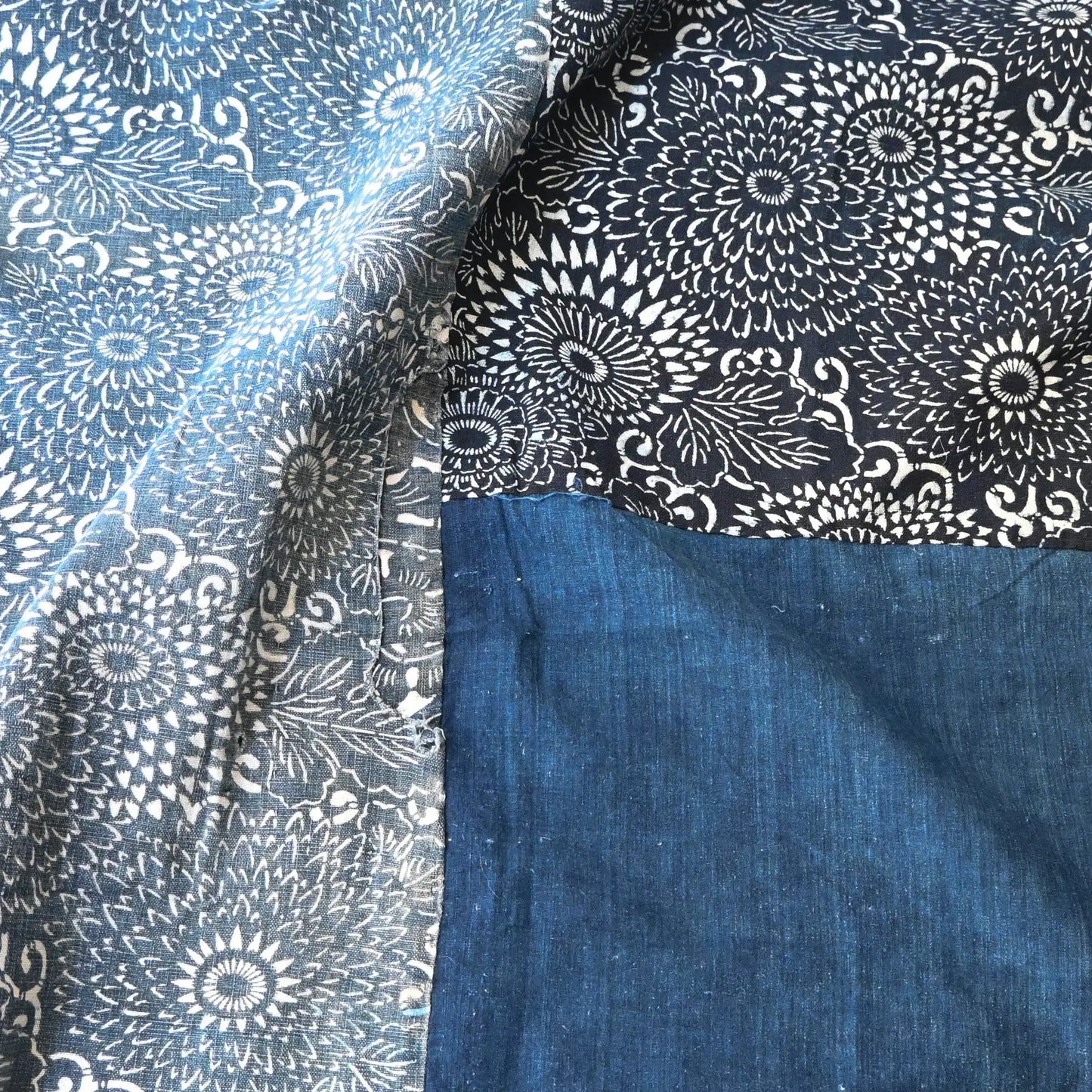 Detailed view of vintage Japanese indigo Katazome dyed and indigo plain cotton futon cover.