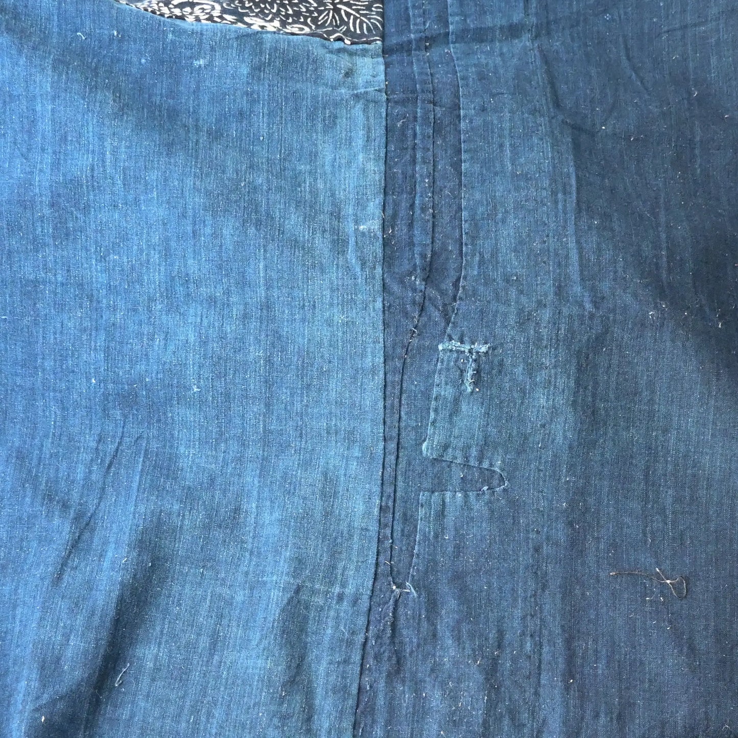 Detailed view of vintage Japanese indigo Katazome dyed and indigo plain cotton futon cover.