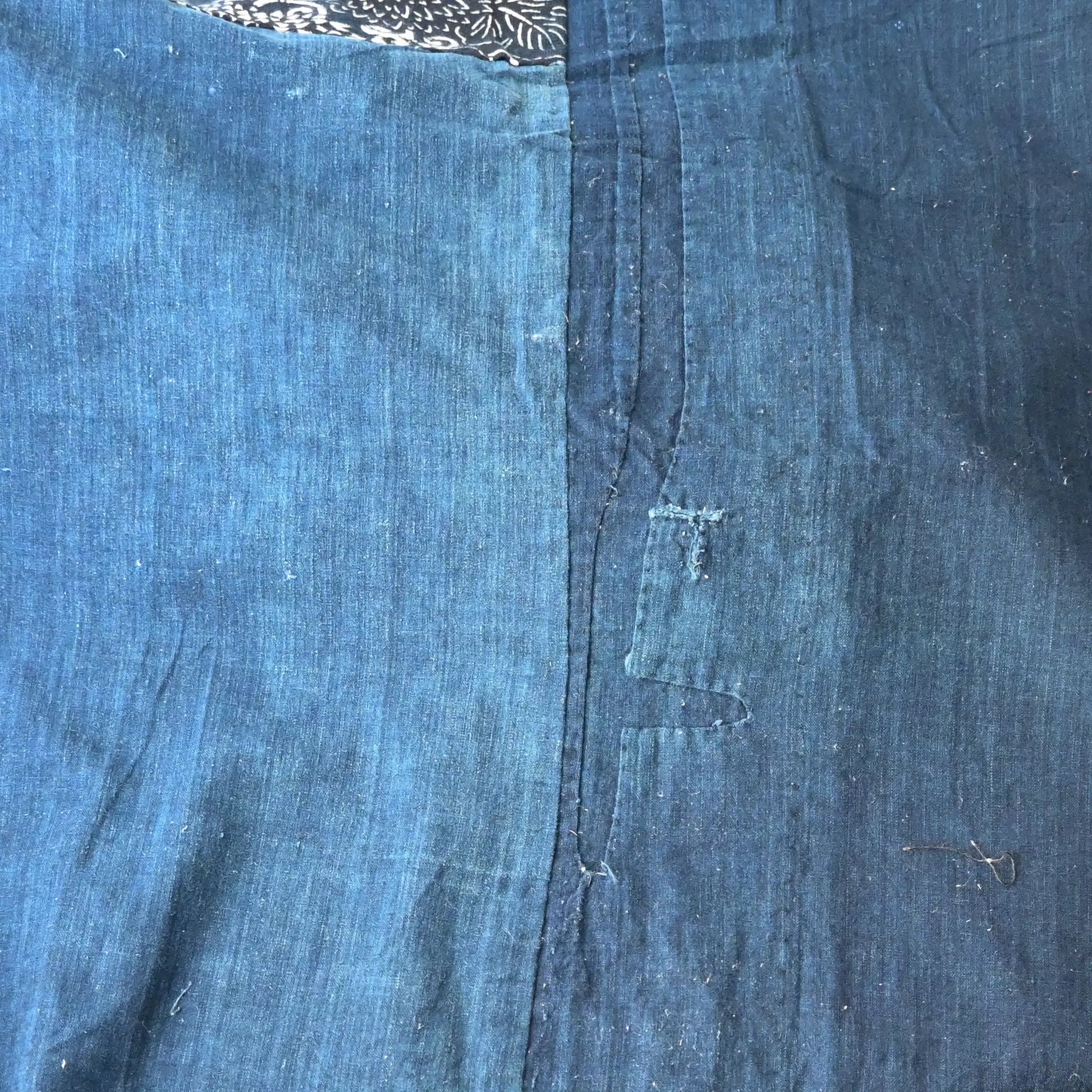 Detailed view of vintage Japanese indigo Katazome dyed and indigo plain cotton futon cover.