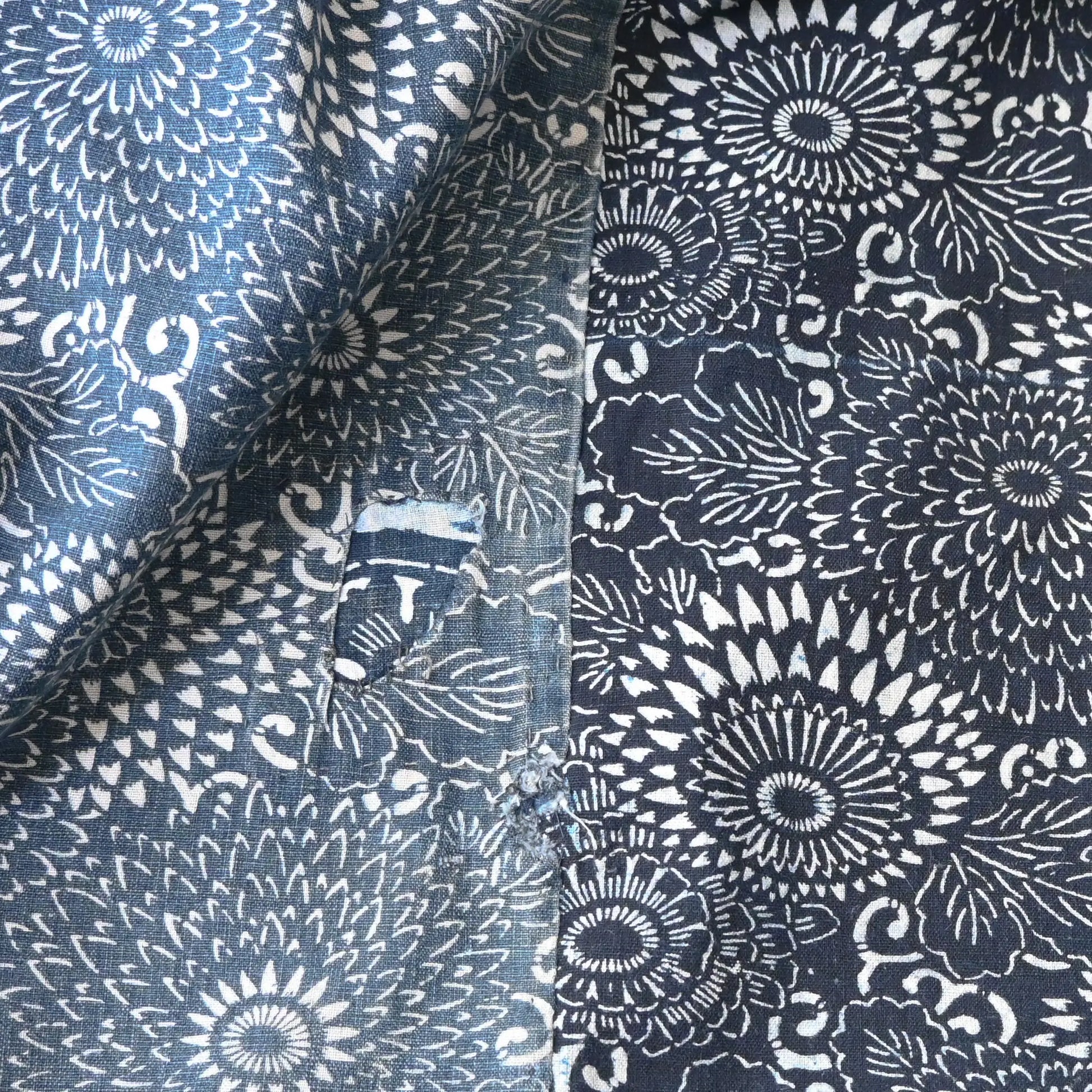 Detailed view of vintage Japanese indigo Katazome dyed and indigo plain cotton futon cover.