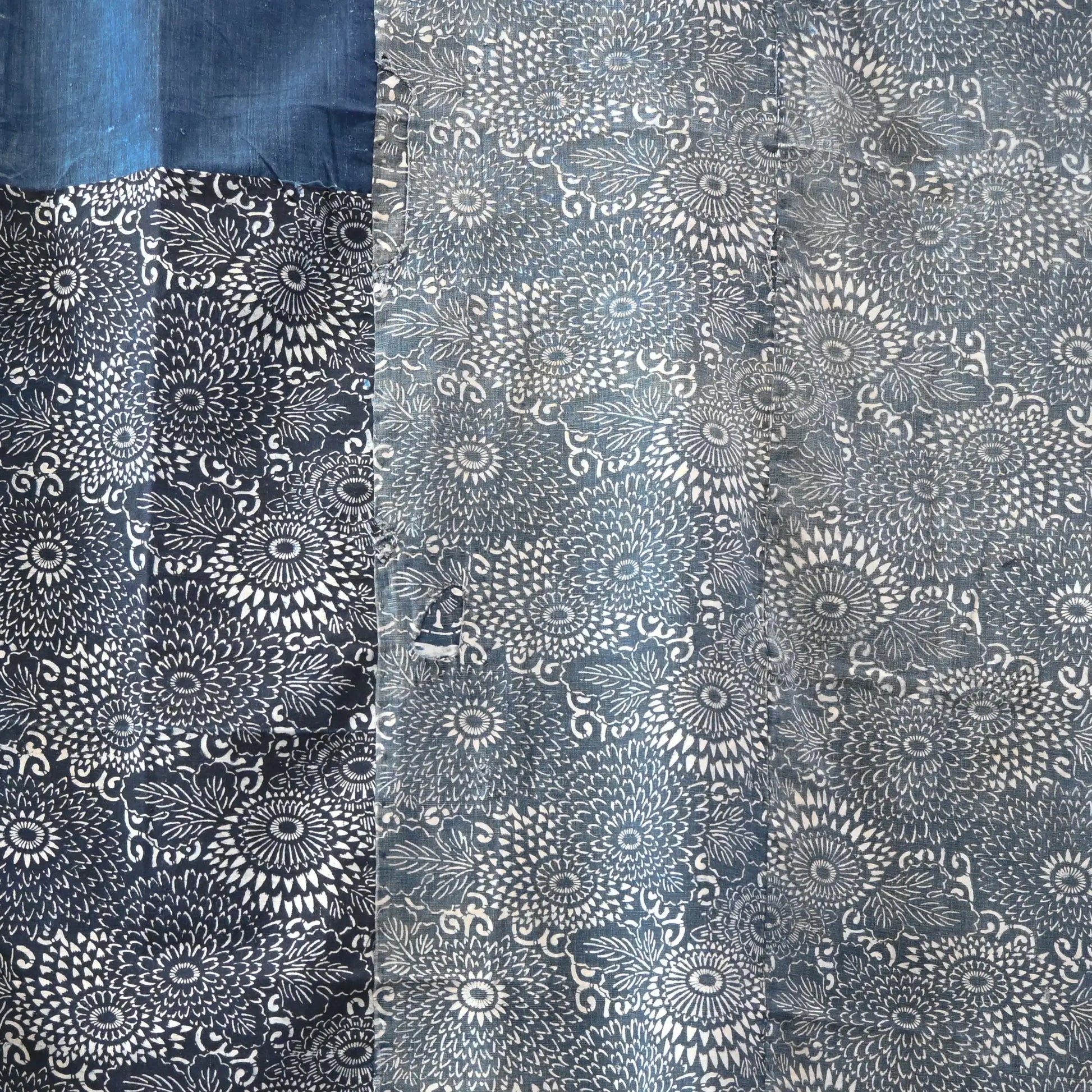 Detailed view of vintage Japanese indigo Katazome dyed and indigo plain cotton futon cover.