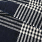 Detailed view of vintage indigo striking check cotton futon cover panel from the mid-20th century.