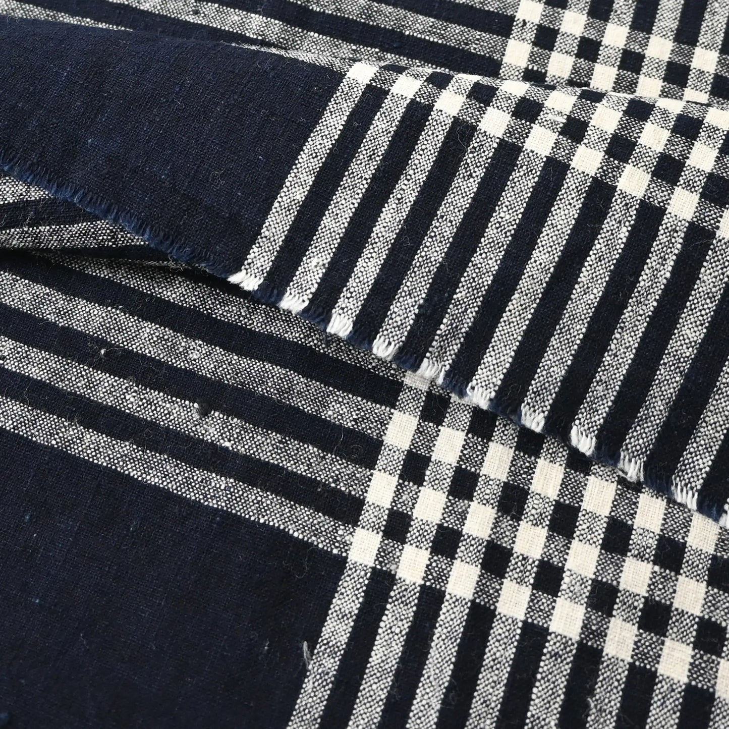 Detailed view of vintage indigo striking check cotton futon cover panel from the mid-20th century.