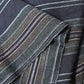 Close-up view of vintage Japanese indigo stripe cotton piece from a futon cover, mid-20th century.