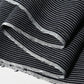 Close-up view of vintageJapanese heavy weight indigo stripe cotton fabric piece from undone kimono.