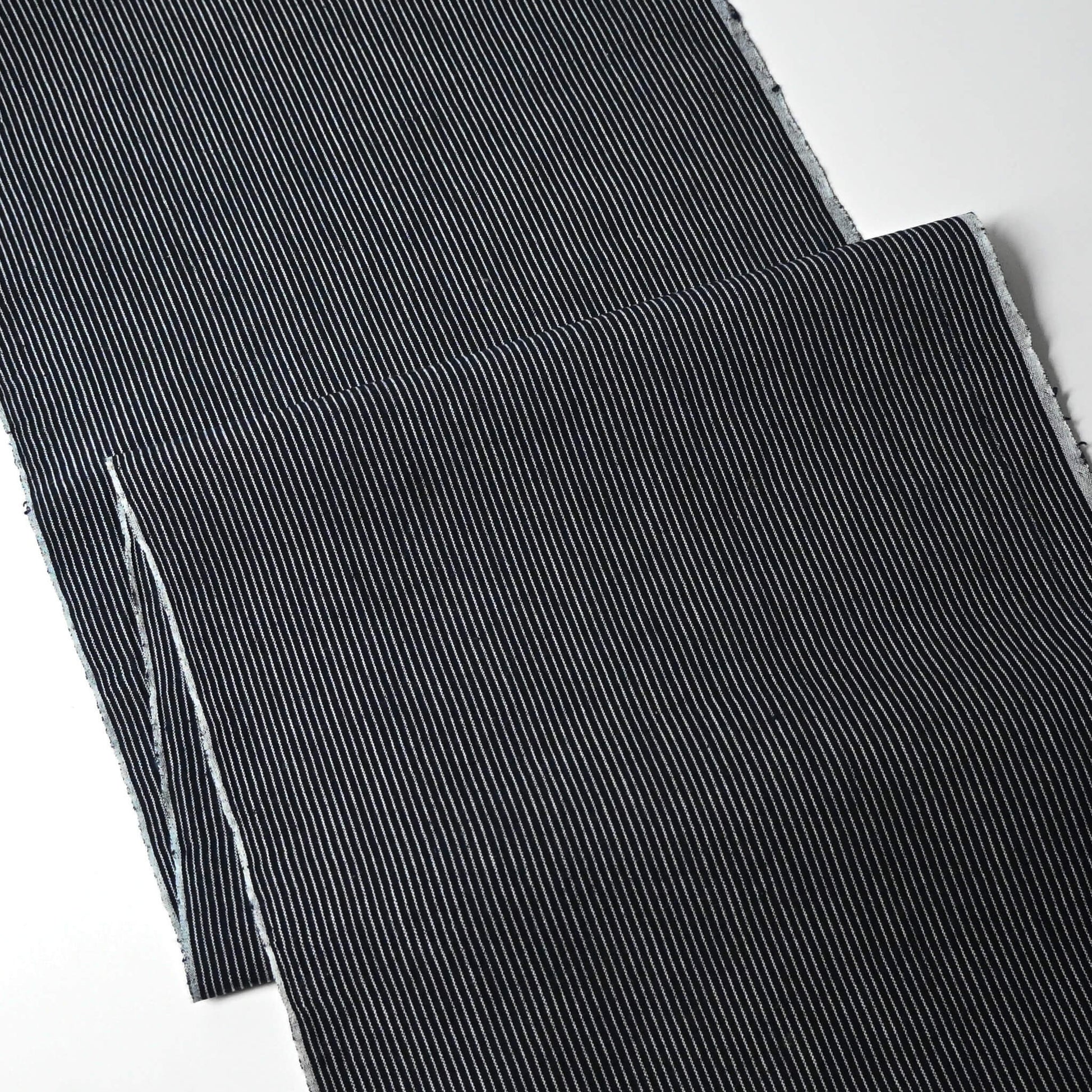 Full view of vintageJapanese heavy weight indigo stripe cotton fabric piece from undone kimono.