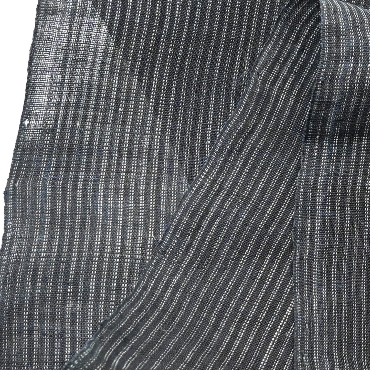 Close-up view of vintage indigo stripe hemp piece from undone kimono.
