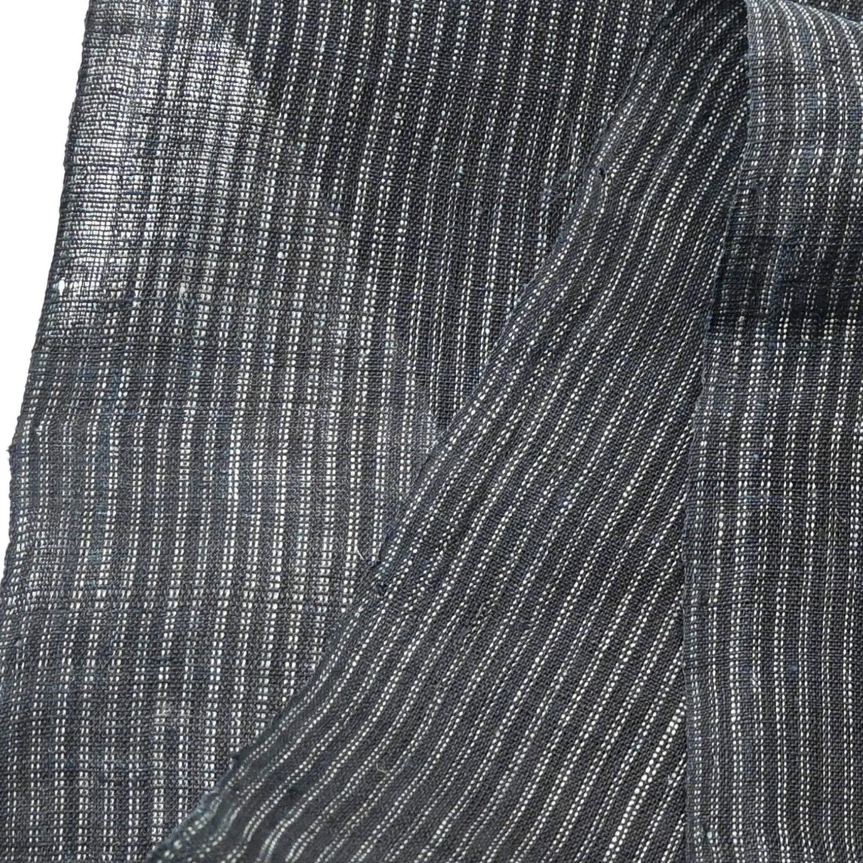 Close-up view of vintage indigo stripe hemp piece from undone kimono.
