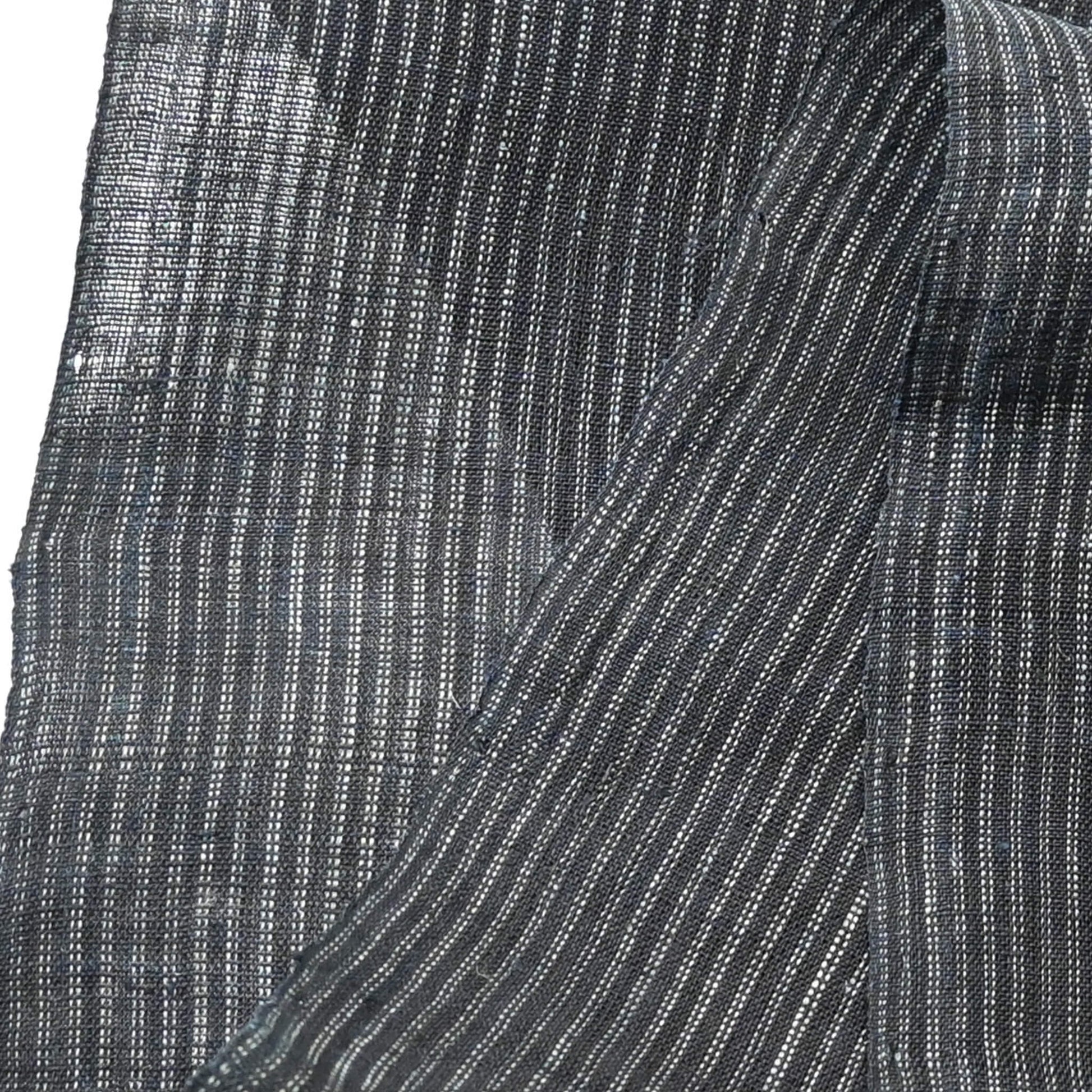 Close-up view of vintage indigo stripe hemp piece from undone kimono.