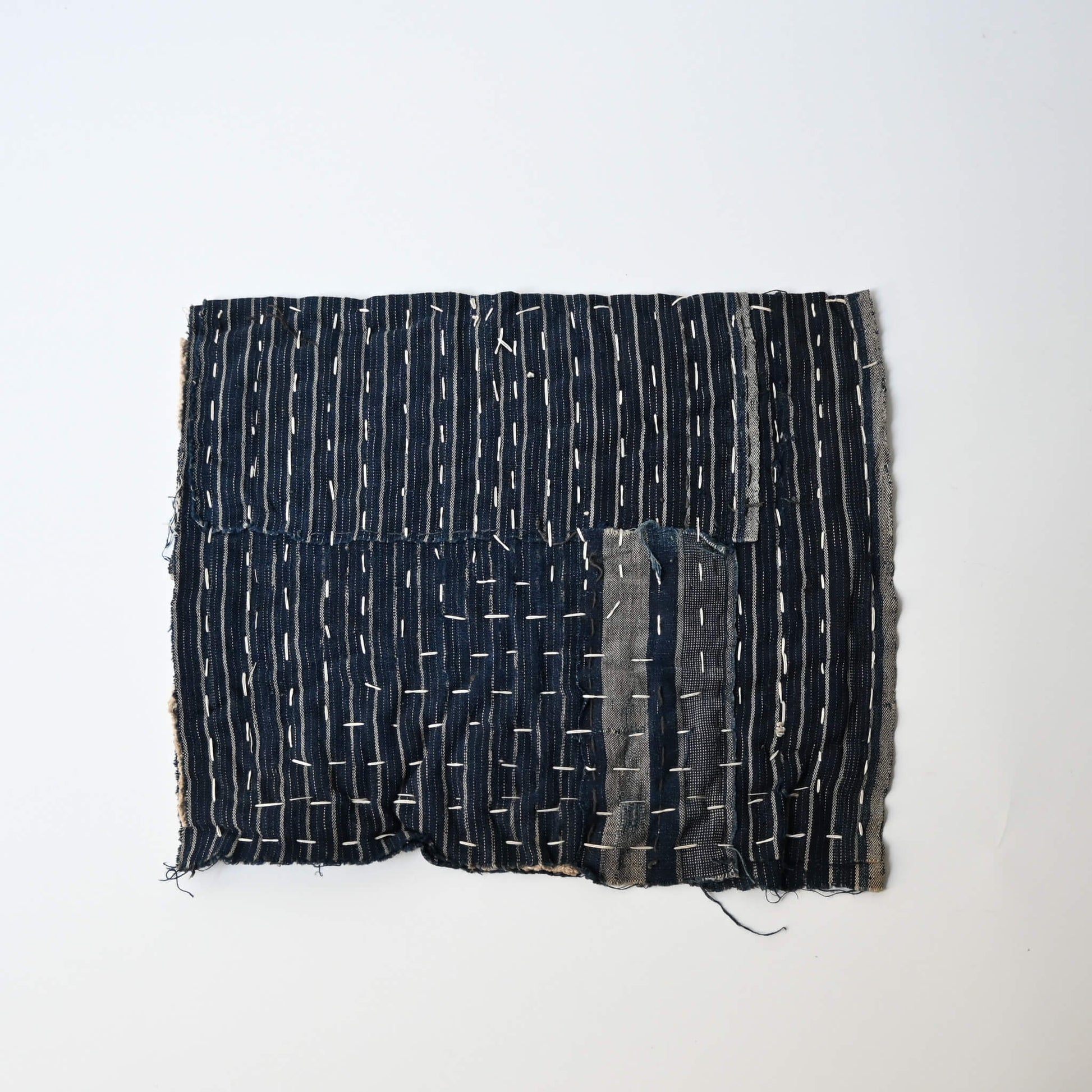Vintage Japanese indigo Zokin cleaning cloth made from old recycled pieces with hand sashiko stitching.