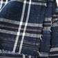 Close-up view of vintage Japanese indigo zanshi ori cotton with check pattern.