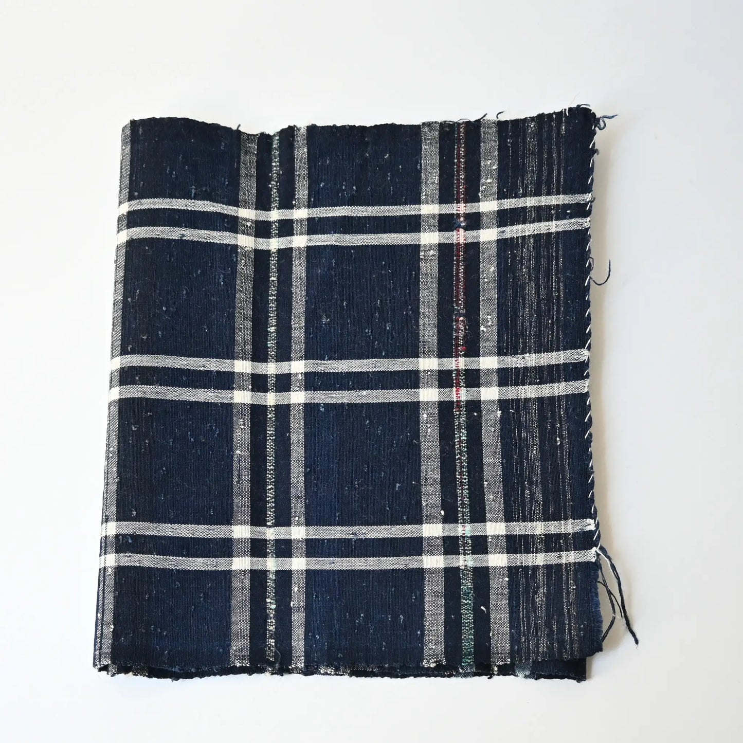 Vintage Japanese indigo zanshi ori cotton with check pattern.
