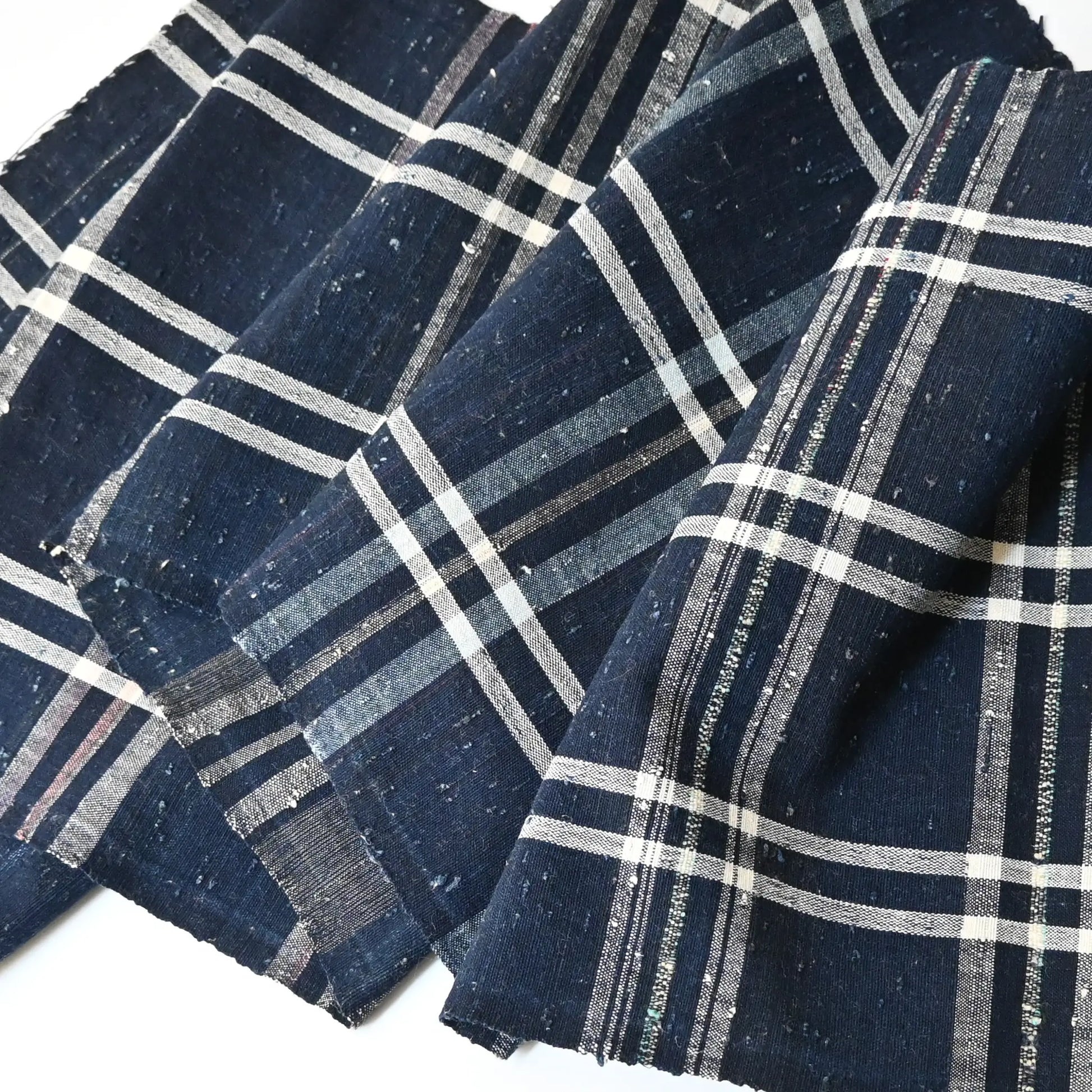 Vintage Japanese indigo zanshi ori cotton with check pattern.