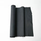 Vintage men's kimono silk fabric roll in black with blue woven Kikko hexagon motif.