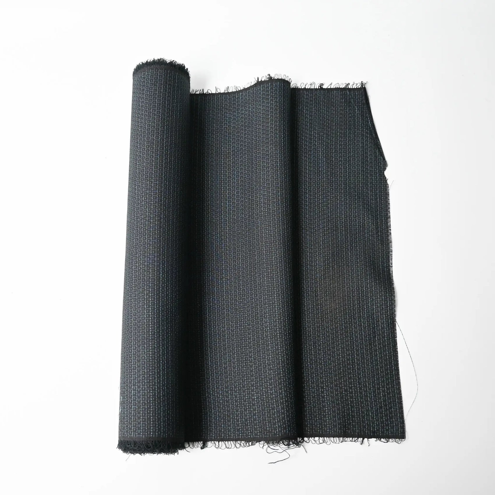 Vintage men's kimono silk fabric roll in black with blue woven Kikko hexagon motif.