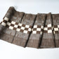 Full view of vintage Isesaki Meisen silk kimono fabric with woven bold check pattern, mid-20th century.