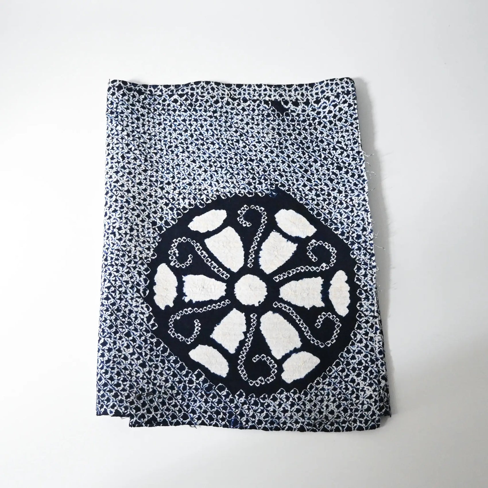 Vintage Japanese Arimatsu shibori yukata cotton fabric with wheel motif.