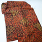 Full view of vintage Japanese autumn colour palette heavy silk crepe kimono fabric with a botanical pattern.