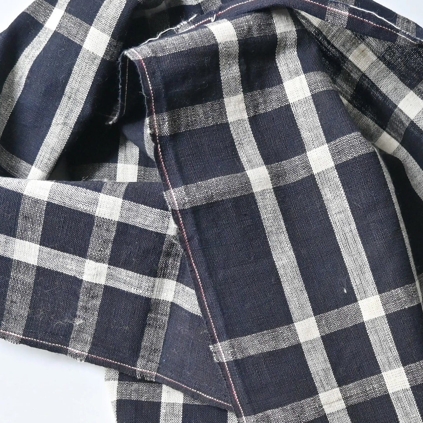 Close-up view of vintage Japanese indigo check cotton from a futon cover, 20th century.