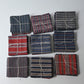 Set of five vintage Japanese cotton kimono fabric pieces in assorted checks and stripes.