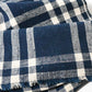 Detailed view of vintage Japanese hand loomed indigo check cotton futon cover panel.