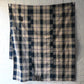 Full view of vintage Japanese indigo and soft pink check cotton futon cover with mended patches, boro textiles.