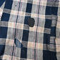 Vintage Japanese indigo and soft pink check cotton futon cover with mended patches, boro textiles.
