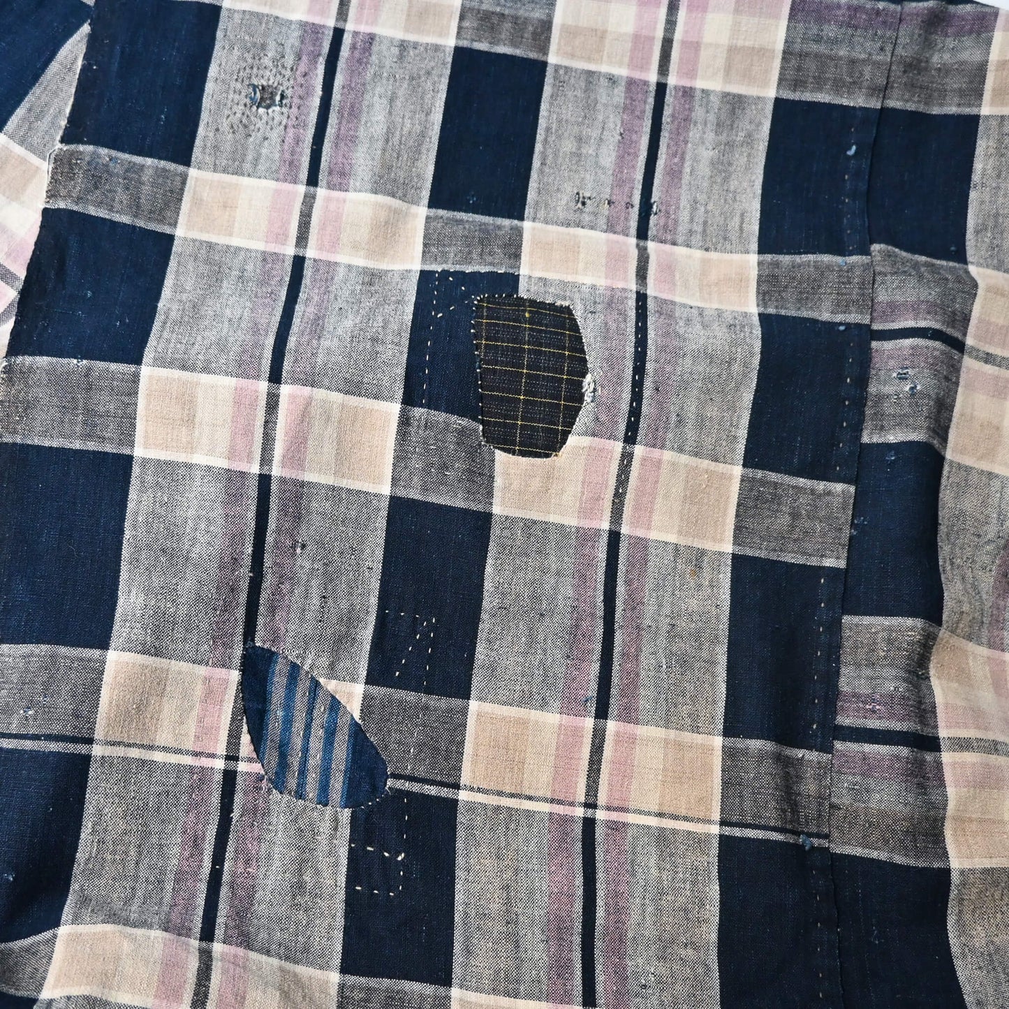 Vintage Japanese indigo and soft pink check cotton futon cover with mended patches, boro textiles.