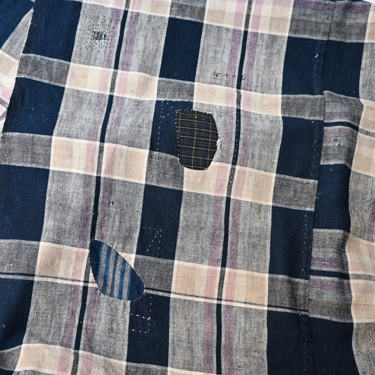 Vintage Japanese indigo and soft pink check cotton futon cover with mended patches, boro textiles.