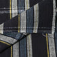 Close-up view of vintage Japanese indigo check cotton fabric piece.