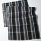 Full view of vintage Japanese indigo check cotton fabric piece.