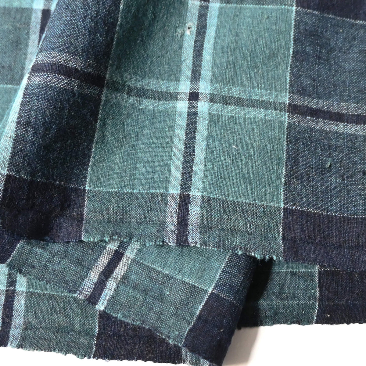 Close-up view of vintage Japanese indigo check cotton from futon cover.