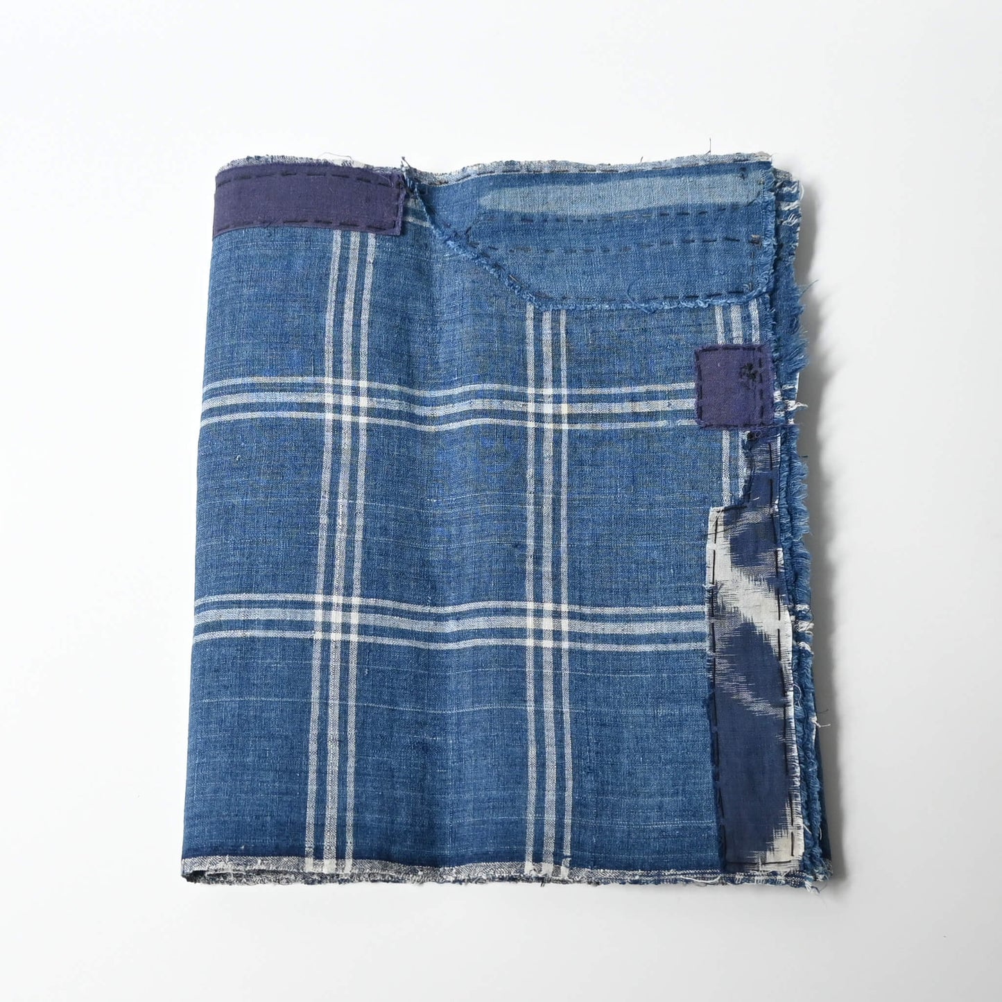 Vintage Japanese indigo check cotton, boro mended piece from an old futon cover.