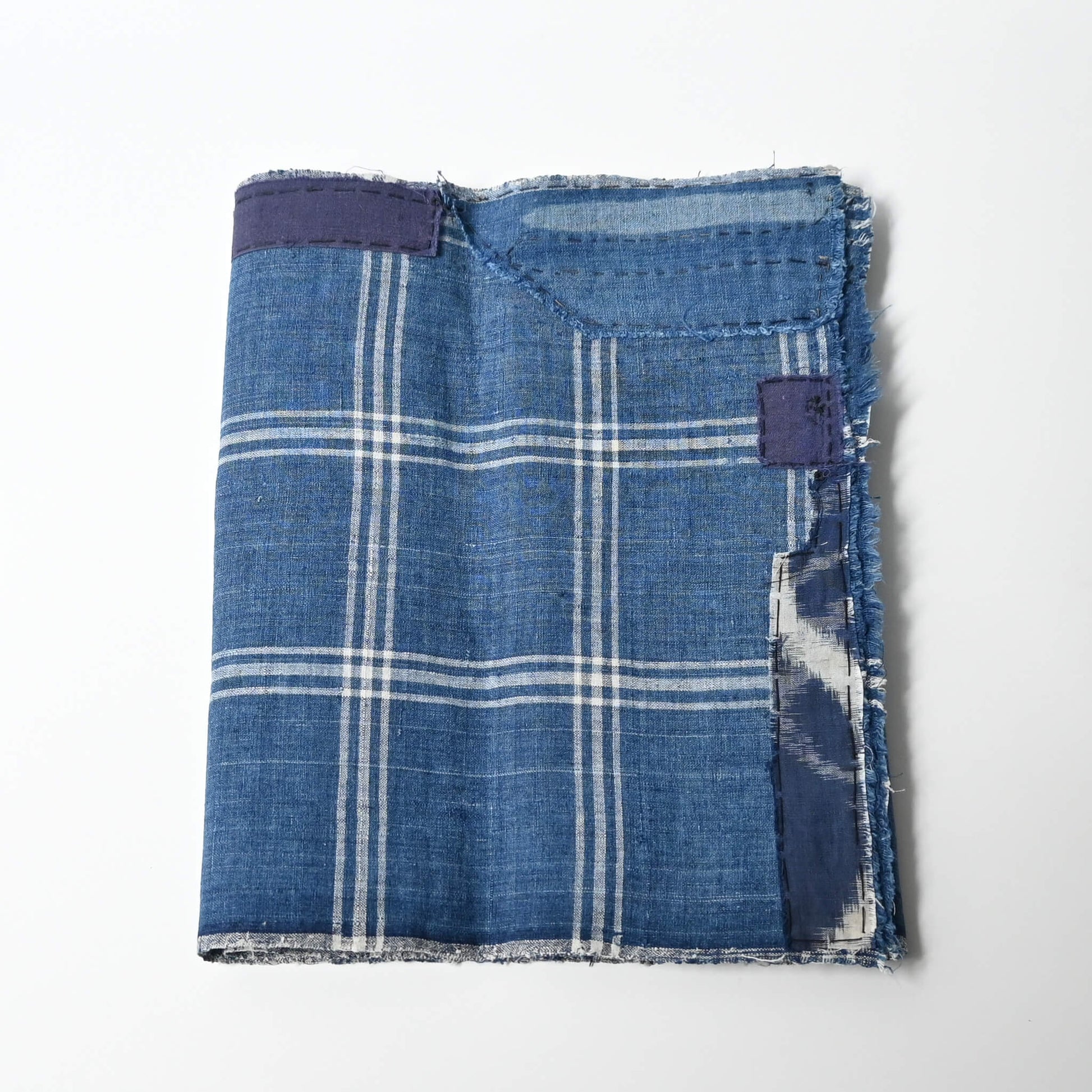 Vintage Japanese indigo check cotton, boro mended piece from an old futon cover.