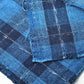 Close-up view of vintage Japanese indigo check cotton from a futon cover.